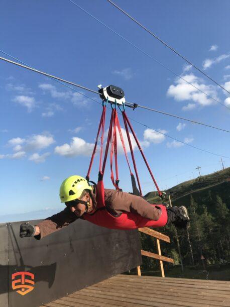 Self-braking Zip line pulley with integrated magnetic brake