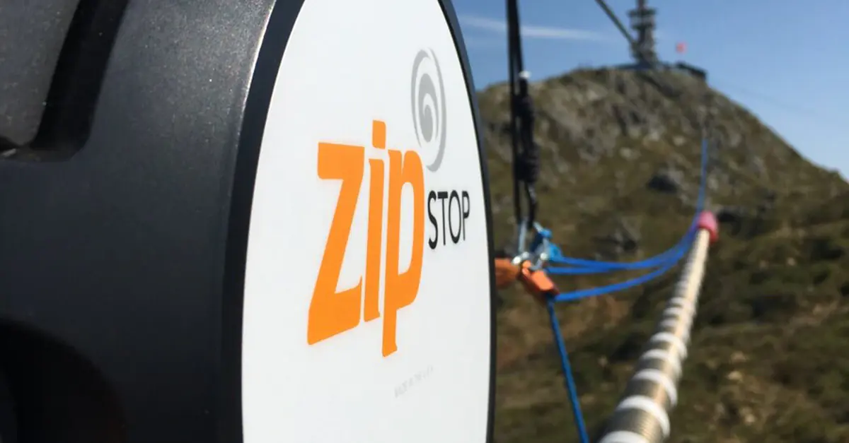 Is your zip line compliant? Discover what an Emergency Arrest Device is and why this backup brake is mandatory for avoiding a single point of failure.