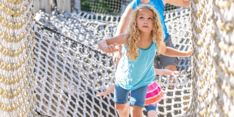 Comparing High Ropes Course Belay Systems for Your Park